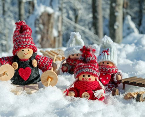A photo of dolls with snowboards in the forest | Family With Kids: The Best Tour in Copenhagen | Amitylux Tours | Guided Tours | VIP & Luxury Experiences