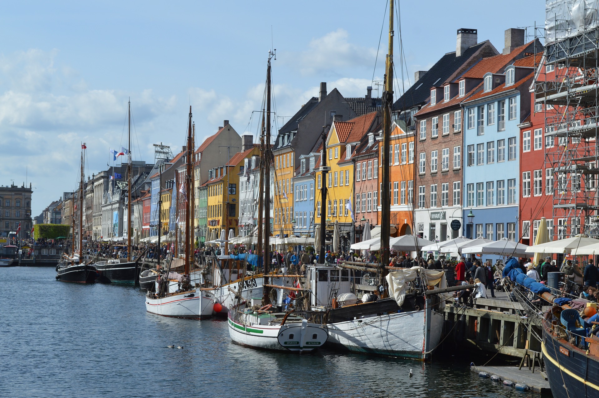 A photo of Nyhavn in Copenhagen, Denmark during daytime | Unique Custom Tours: The Magic of Nordic Countries | Amitylux Tours | Scandinavian Guided Tours | VIP & Luxury Experiences in the Nordics