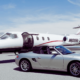 A private jet and a luxury car parked at the airport | Private Jet Luxury Services | Fly With Us | Amitylux Tours | Guided City Tours | VIP & Luxury Experiences