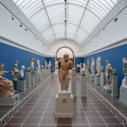 A photo of inside of Glyptotek Museum showing multiple statues | The Best 4 Museums in Copenhagen | Amitylux Tours | Guided City Tours | VIP & Luxury Experiences