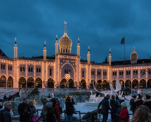A photo of Christmas decorated Tivoli Gardens | The Best 7 Family Attractions in Copenhagen | Amitylux Tours | Guided Tours | VIP & Luxury Experiences
