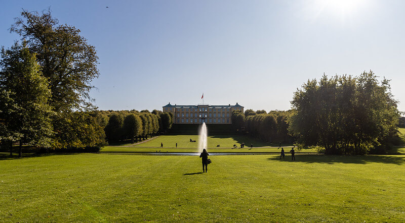 A photo of Frederiksberg Gardens during daytime with the sun shining | Copenhagen In Spring: The Best 5 Outdoor Activities | Amitylux Tours | Scandinavian Guided Tours | VIP & Luxury Experiences in the Nordics