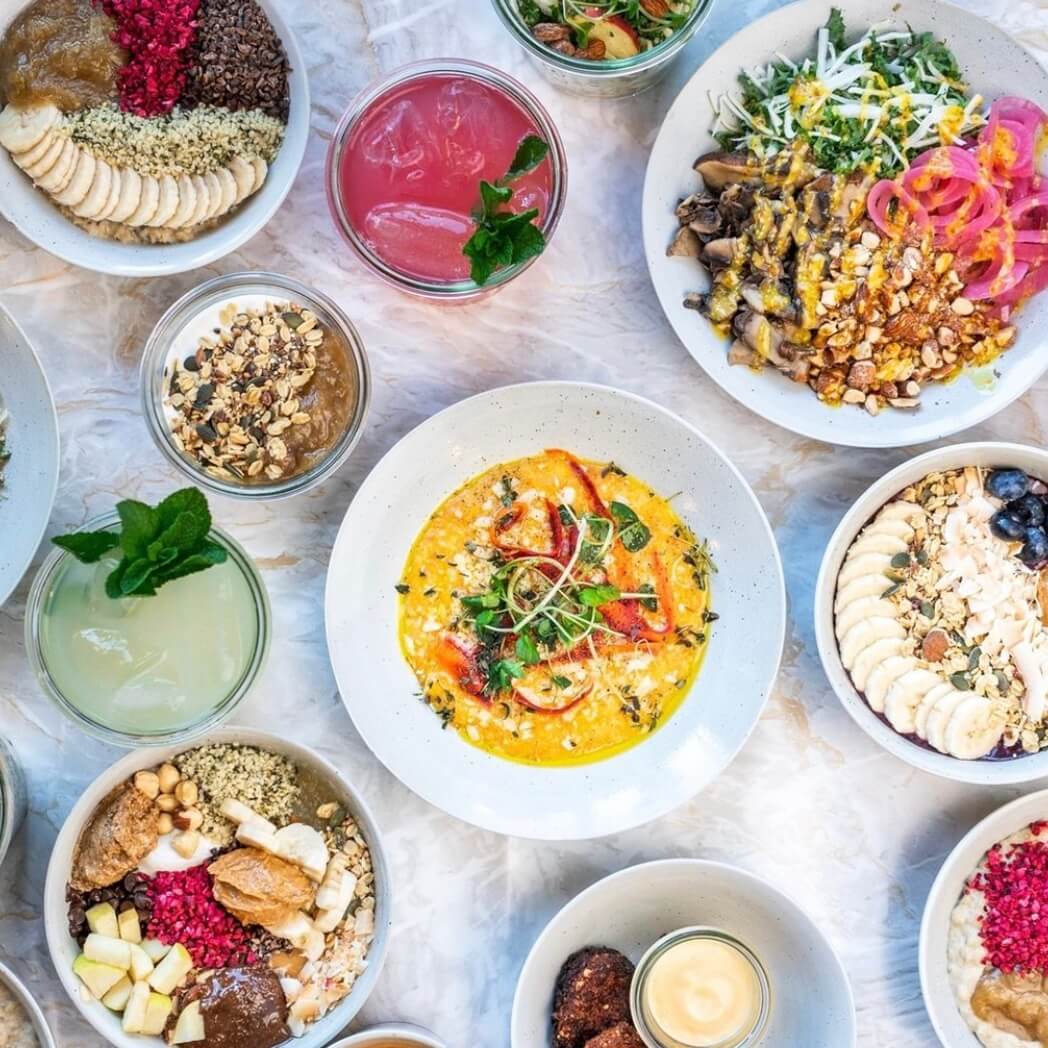 A photo of multiple bowls of meals at Grød | The Best Breakfast Places in Copenhagen | Amitylux Tours | Scandinavian Guided Tours | VIP & Luxury Experiences in the Nordics