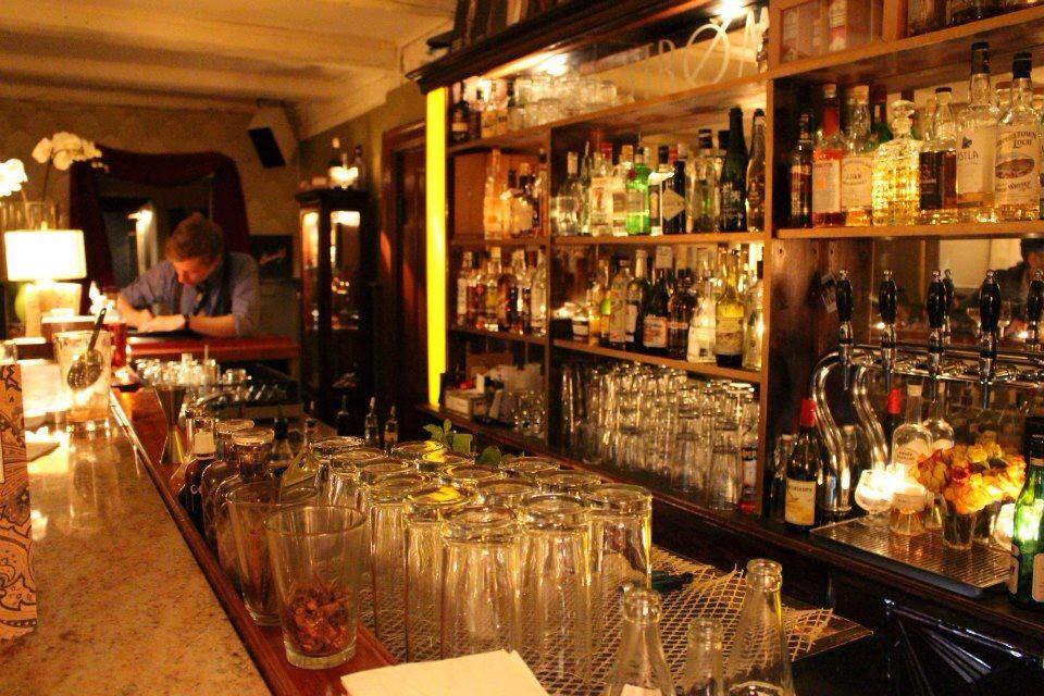 A photo of the bar of the Strøm cocktail bar | The Best 5 Cocktail Bars in Copenhagen | Amitylux Tours | Scandinavian Guided Tours | VIP & Luxury Experiences in the Nordics