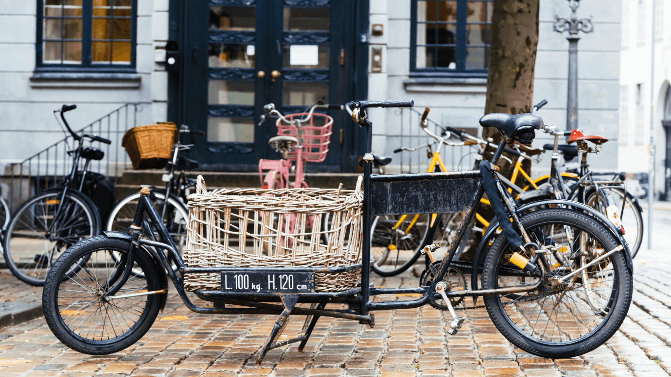 A cargo bike parked daytime in Copenhagen | Amitylux Tours | Scandinavian Guided Tours | VIP & Luxury Experiences in the Nordics