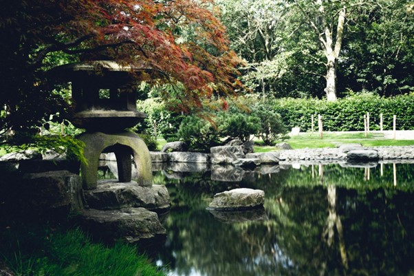 he best gardens to visit in London: The kyoto Garden, Holland park, London. Garden and pond in Holland park, London.