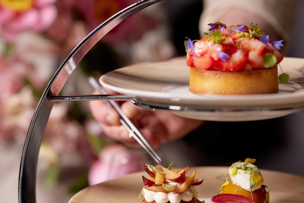 Tea in London. The best sports for tea in London in the summertime. Photo  by Four Seasons Hotel London at Park Lane on May 03, 2Afternoon tea platter with treats and sweets