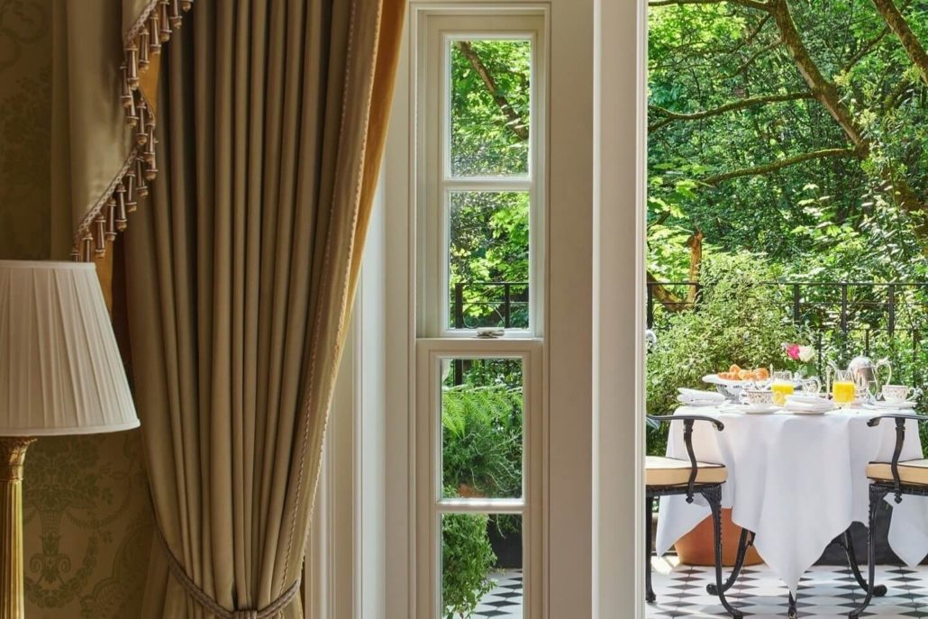 Tea in London. The best sports for tea in London in the summertime. Photo by The Goring on May 29, 2024.  An image a set table on a balcony at the Goring Hotel.