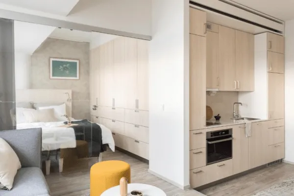 Noli Studio's room with kitchen, bed and sofa