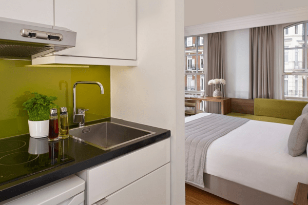 bedroom with a kitchen at Citadines South Kensington
