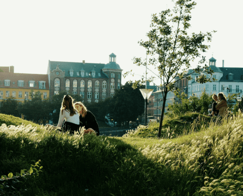 women sitting in a garden in Copenhagen