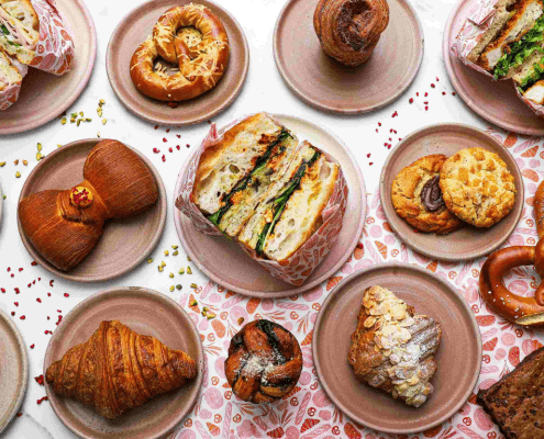 a brunch spread of bakeries and sandwiches