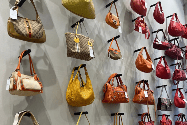 colorful vintage handbags on the wall