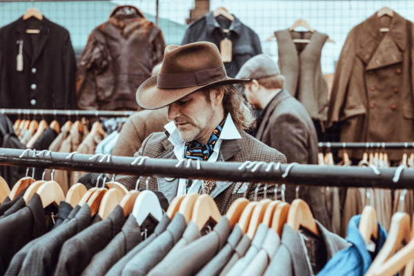 a man shopping inside a clothing store
