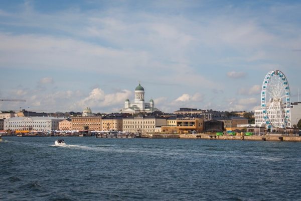 Kauppatori | Helsinki A photo of Kauppatori during daytime shwoing the cathedral, the sea, and the amusement park | Helsinki (Part 1): A Must See List of Unique Sites | Amitylux Tours | Guided City Tours | VIP & Luxury Experiences